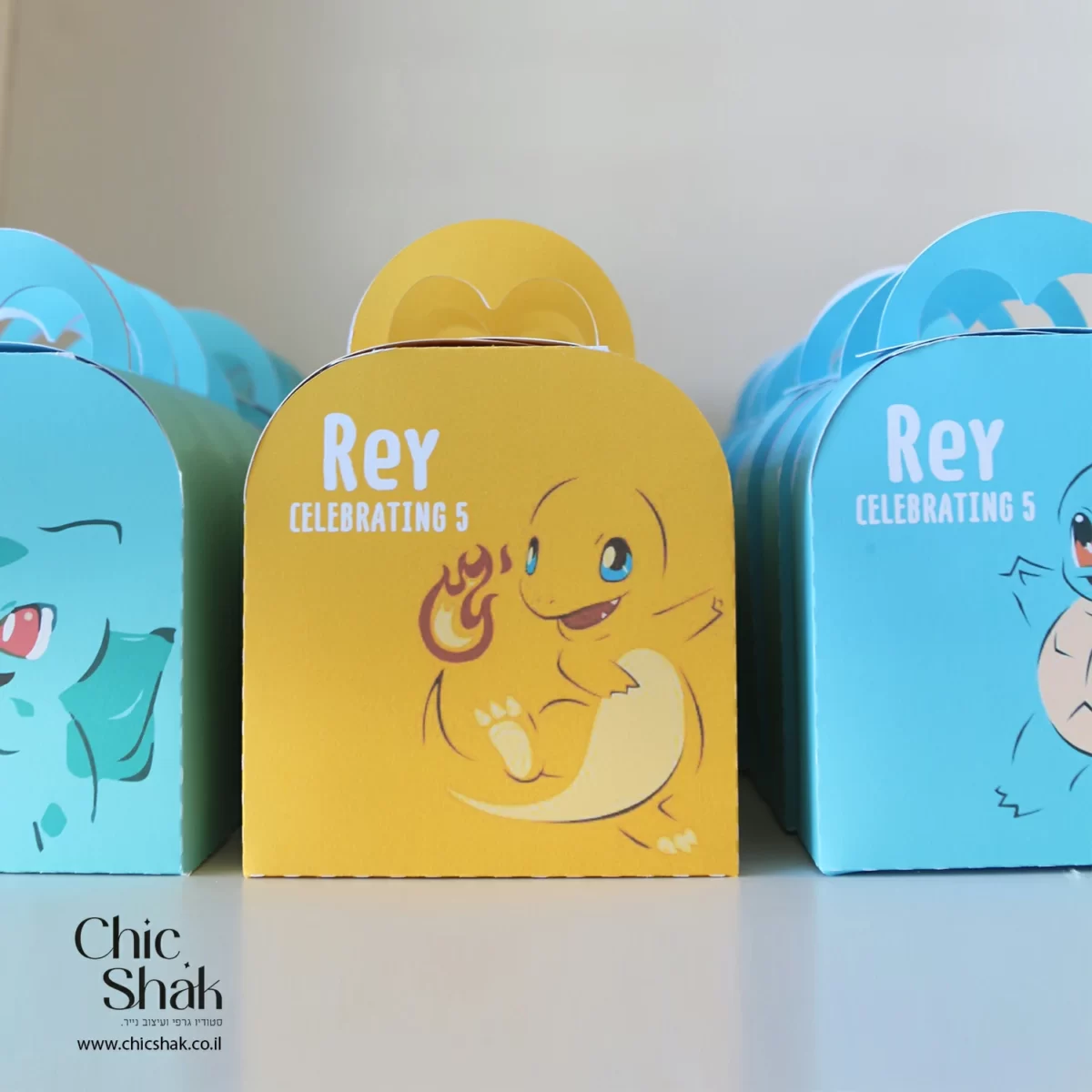 קופסת תיק לעיצוב יום הולדת בקונספט פוקימון כתום